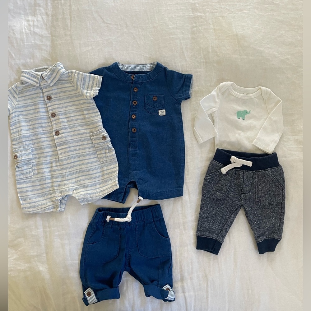 Newborn bundle of rompers, pants and onesie. Good condition. Bought at Target.